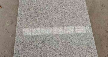 信阳芝麻白光面毛板