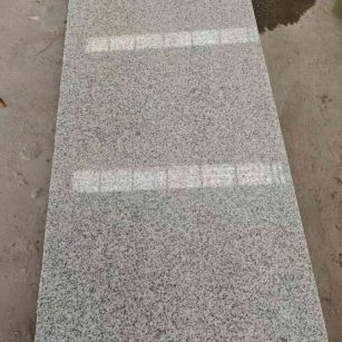 信阳芝麻白光面毛板